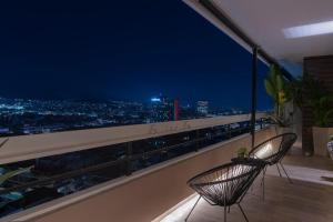 The HostMaster Skyline Tower View Suite