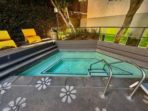 Serene Stay with Pool Access & Balcony