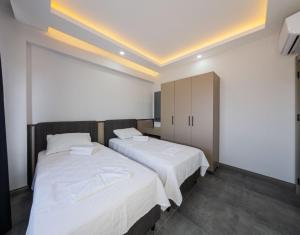 Dorado Suit No 12 İki Tek Yataklı Havuz manzaralı