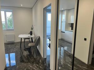 Сучасні апартаменти в новому ЖК Great House,район автовокзалу,центр,поруч обласна лікарня,парковка,автономне опалення,два окремі місця