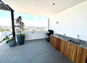 Hermoso Departamento frente a Midtown con Parking