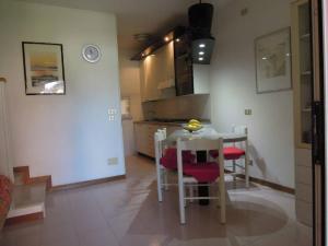 Spacious apartment with terrace and pool in Bibione