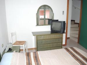 Spacious apartment with terrace and pool in Bibione