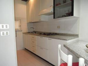 Spacious apartment with terrace and pool in Bibione