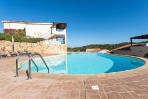 ISA-Residence with swimming-pool just 4 km from Baja Sardinia, apartments with outdoor private space and air conditioning