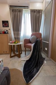 Atlantiis suites By Signature Stayz Girjaghar Near Vishwanath Temple