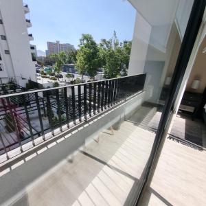 Frente a Hospital U de Chile con estacionamiento