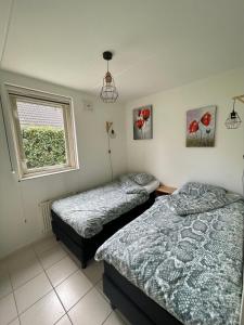 Compleet huisje tussen de weilanden in Ewijk