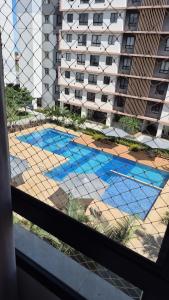 Apto novo condominio com vista para piscina