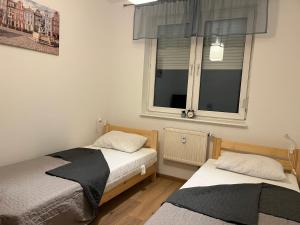 Dom Tobie bliski APARTAMENT W PARKU WARTA PRYWATNA KUCHNIA LAZIENKA PARKING