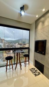 2 suítes, 2 garagens proximo ao HardRock Cafe Itapema