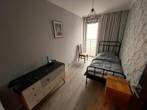 Blue Apartment with Balcony