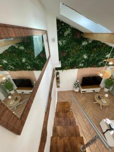 Le Perchoir de Linas, filet suspendu, appartement cosy