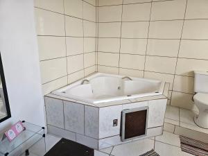 Casa com Banheira de Hidromassagem