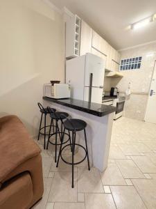 Condomínio pé na areia flat privê