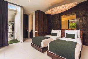 Varenya Cozy 1 BR Suite Twin Room