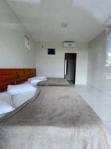 Casa de praia sofisticada com piscina e quadra