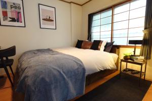 Den SUSUKINO ROOMS