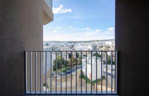 Elegant 12th Floor Studio with Balcony and City Views