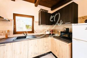 TD Truly Trulli Gentle Breezes Across Olive Valley