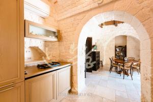 TD Truly Trulli Gentle Breezes Across Olive Valley