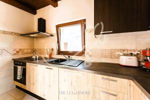 TD Truly Trulli Gentle Breezes Across Olive Valley