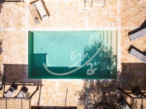 TD Truly Trulli Gentle Breezes Across Olive Valley