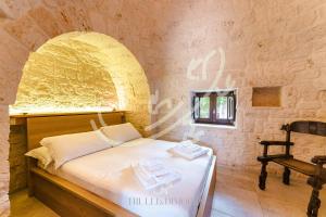 TD Truly Trulli Gentle Breezes Across Olive Valley