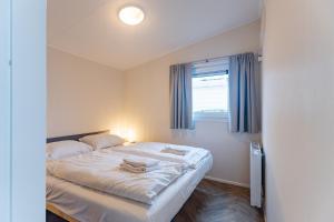 Welcome in - Chalet Schelp - Camping Duinhoeve Zeeland | omheind en licht | Huisdiervriendelijk