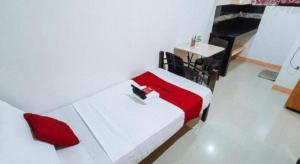 RedDoorz near SGM Condotel Villa Beach Iloilo