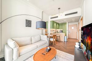 Modern 1BR Apartments in JVC with Pool and City Views