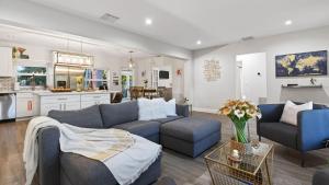 Hot Tub Firepit Deck 10mins to Beach Middle Terrace Cottage by AvantStay