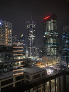 LUX City Center Browary Warszawskie Apartments by Noclegi Renters