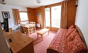 Vacancéole - Résidence Les Chalets de la Ramoure