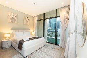 Escape24 Brand New 2BR with Canal Views near Burj Khalifa
