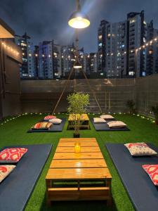Tropical Nest 1BHK Penthouse near AIG Gachibowli