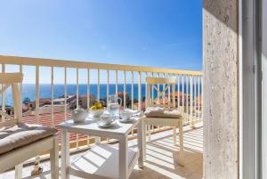 Attico Cerasella con incredibile vista mare in pieno centro e posto auto