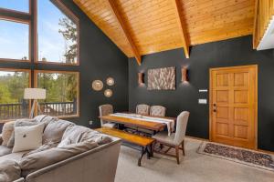 Modern Mountain Chalet with Wall-of-Windows Forest Views.