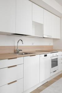 Family apartment in the heart of of the city and sauna