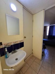 8 beds, 2 baths, across from Mercado Libre