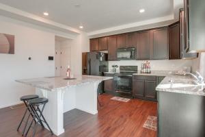 Home Gym and Fenced Backyard Aurora Family Home!