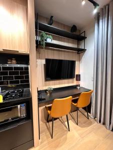 Studio Moderno totalmente equipado e com AC - Próx Av Paulista e Centro de Convenções - Self Check-in