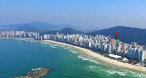 Ap na praia Pitangueiras com 2 vagas Guarujá apartamento