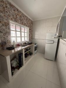 Casa espaçosa na Praia com Wi-Fi, Tv e 2 vagas de garagem