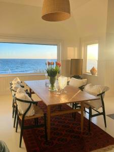 Seaside Hotel-Inspired Home With Sea View