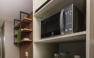 Studio moderno com cara de casa