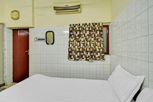 Hotel O Dream Palace Guest House Near Marina Beach