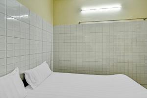 Hotel O Dream Palace Guest House Near Marina Beach
