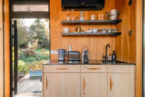 Cosy Mirrored House next to a Magical Swimming Lake