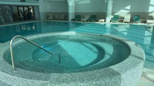 Eliss Studio Sinaia - spa si piscina contra cost